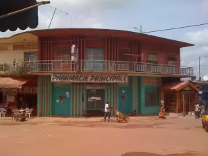 A pharmacy and a street in Gagnoa, Ivory Coast