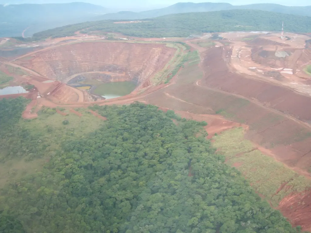 Aerial view of an open-pit gold mine in Africa, illustration