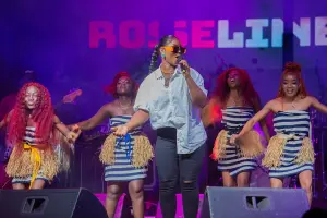 Roseline Layo singing on stage at FEMUA 15 in Bouaké in May 2023