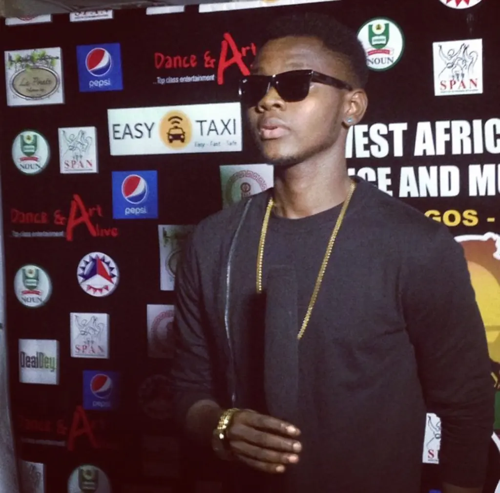 Kizz Daniel lors d’un événement en 2015