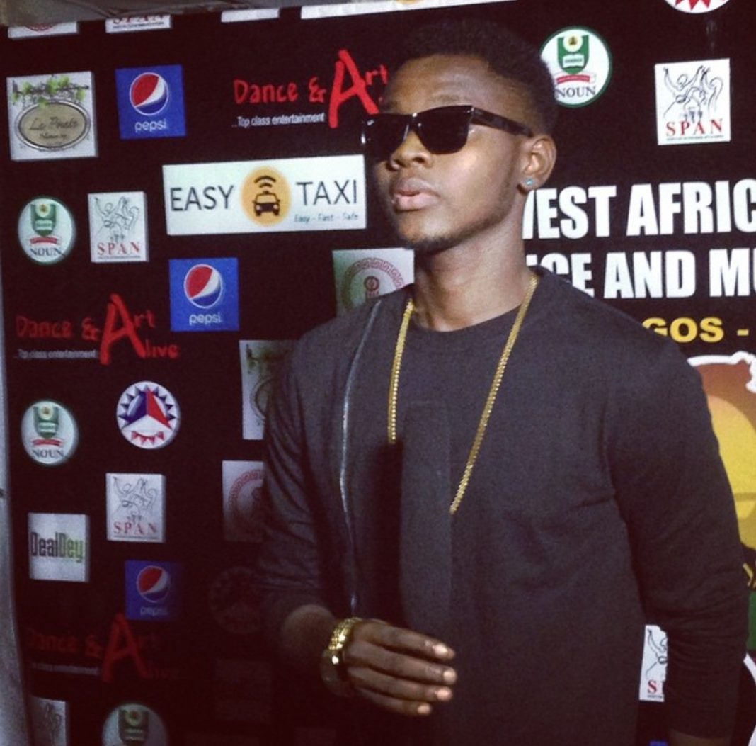 Kizz Daniel lors d’un événement en 2015